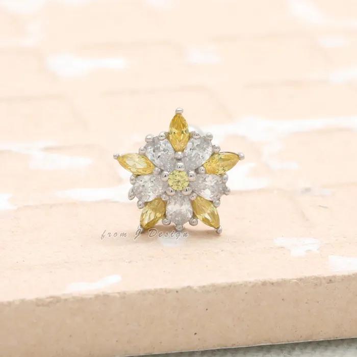 Earrings from J Shop Yellow CZ Accent Star Flower Piercing