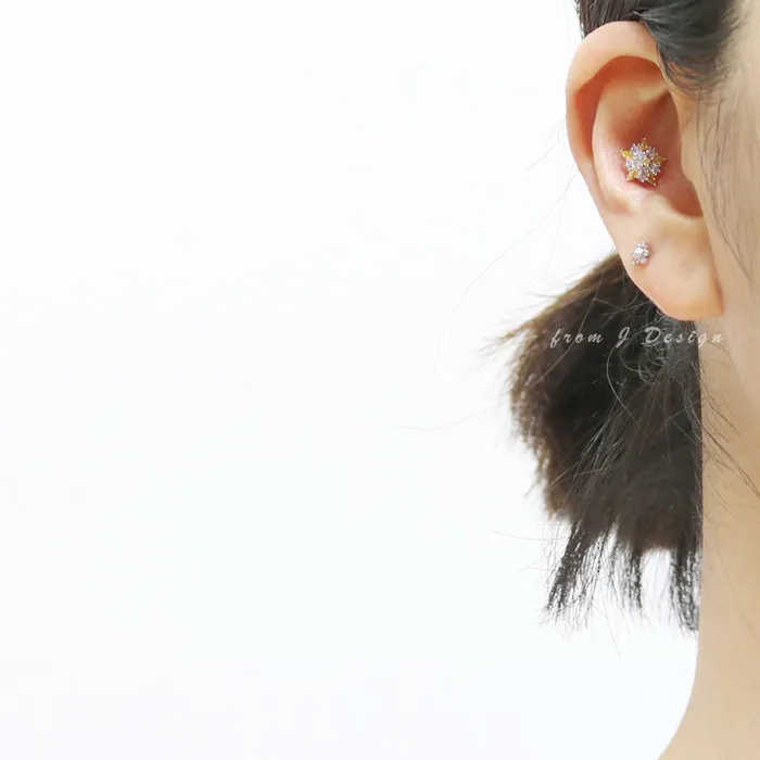 Earrings from J Shop Yellow CZ Accent Star Flower Piercing