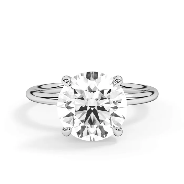 Rings deBebians Classic Solitaire Style Engagement Ring with Diamond Basket
