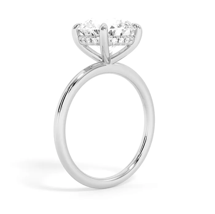 Rings deBebians Classic Solitaire Style Engagement Ring with Diamond Basket