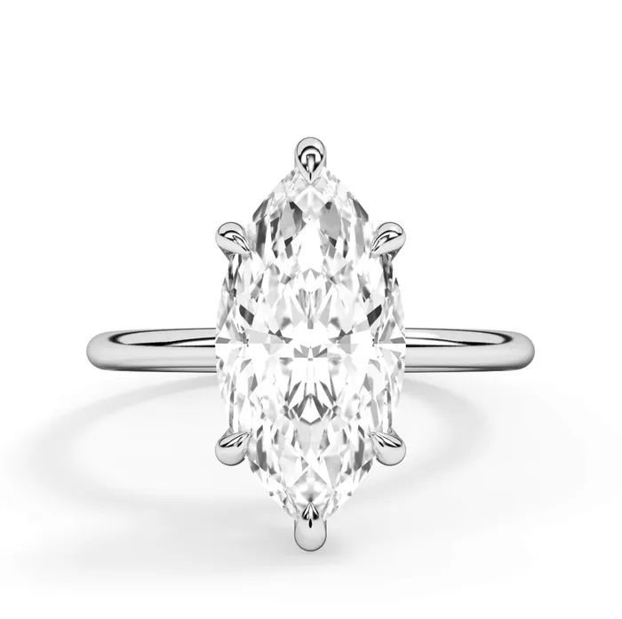 Rings deBebians Classic Solitaire Style Engagement Ring with Diamond Basket