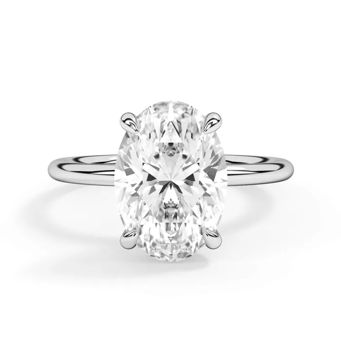 Rings deBebians Classic Solitaire Style Engagement Ring with Diamond Basket