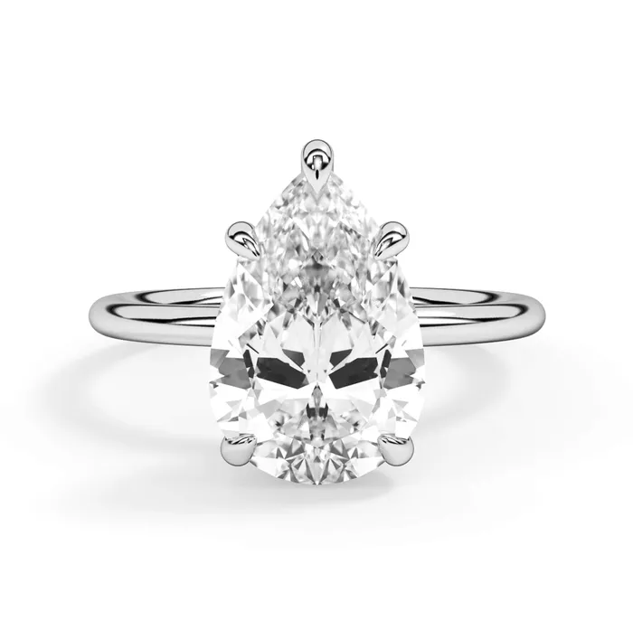 Rings deBebians Classic Solitaire Style Engagement Ring with Diamond Basket