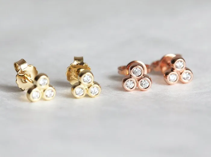 Gold Stud Earrings With 3 Small Round Cut Diamonds Apiece Capucinne Earrings