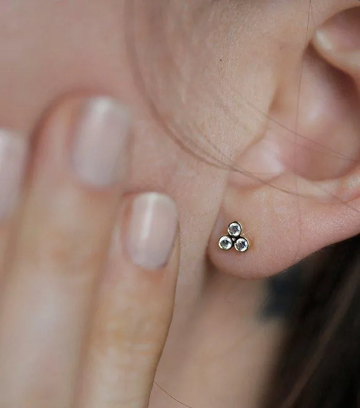 Gold Stud Earrings With 3 Small Round Cut Diamonds Apiece Capucinne Earrings