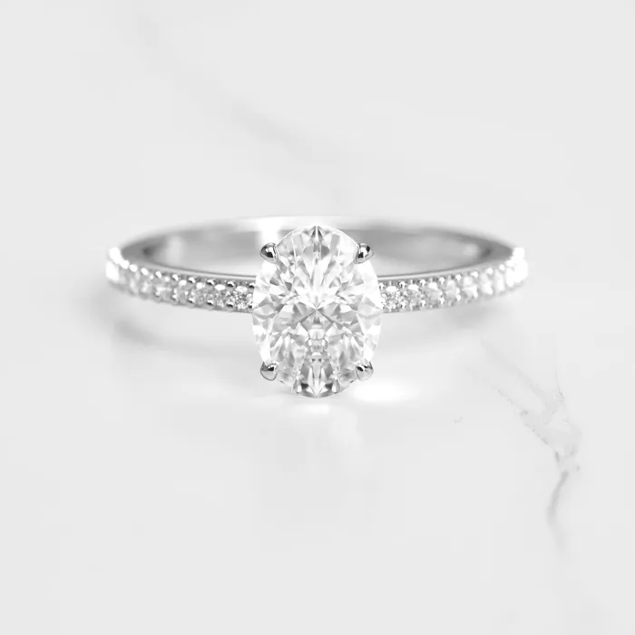 Rings Capucinne Oval Half Pave Moissanite Ring